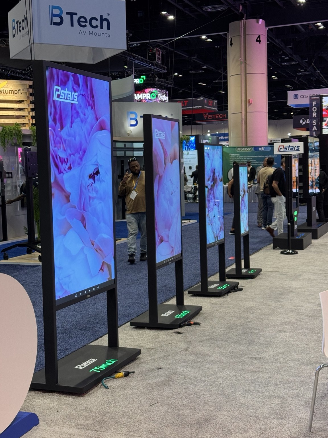 Freestanding digital displays at an industry trade show