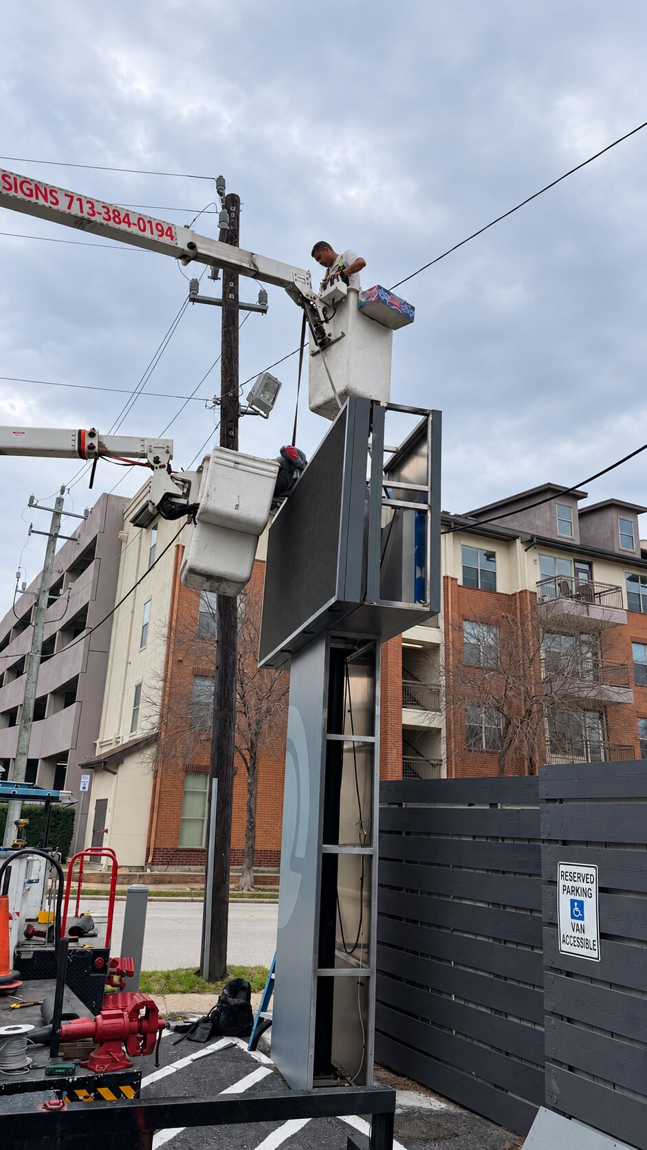Freestanding outdoor LED sign during installation