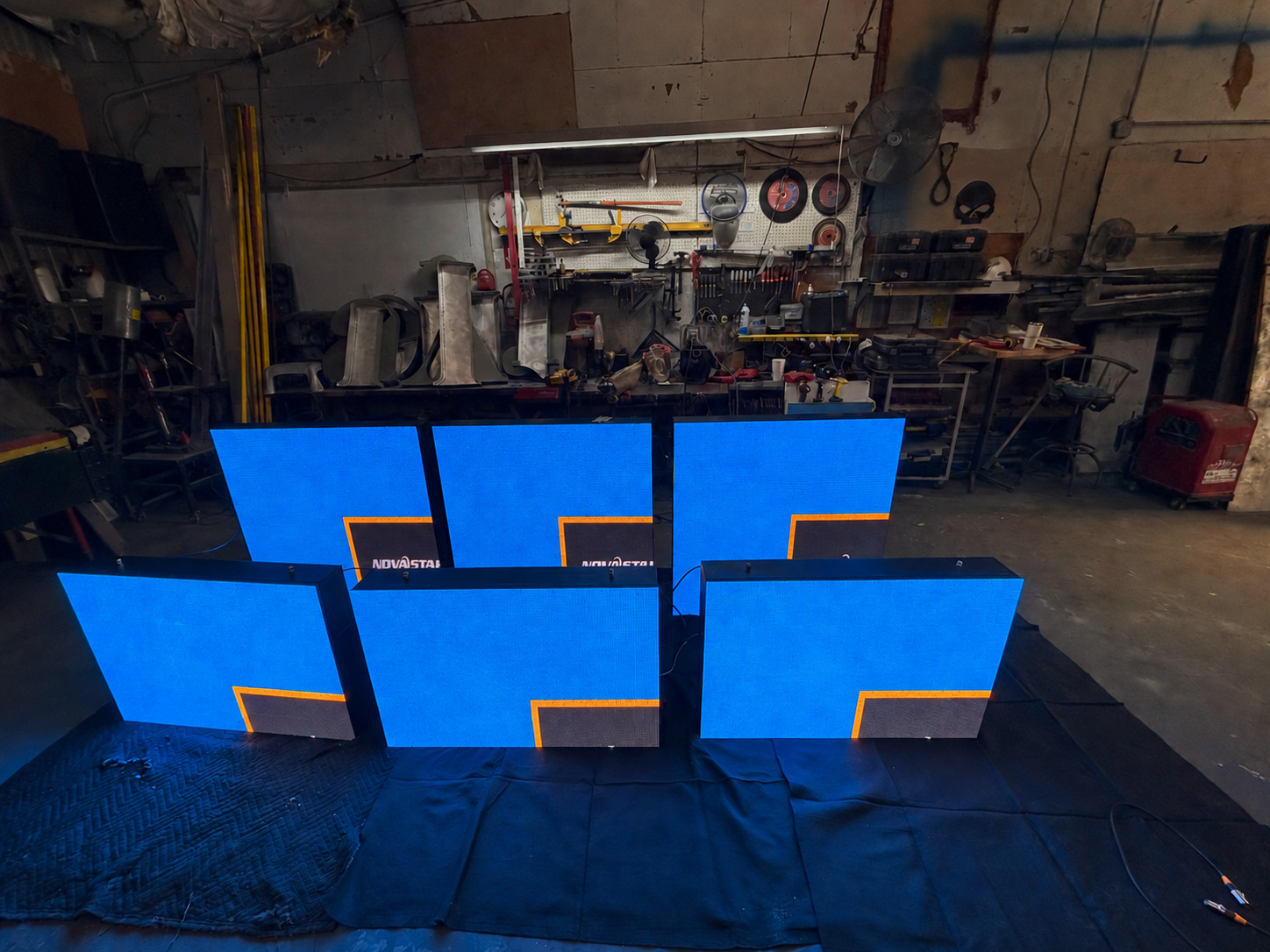 LED panels powered on during bench testing in a workshop