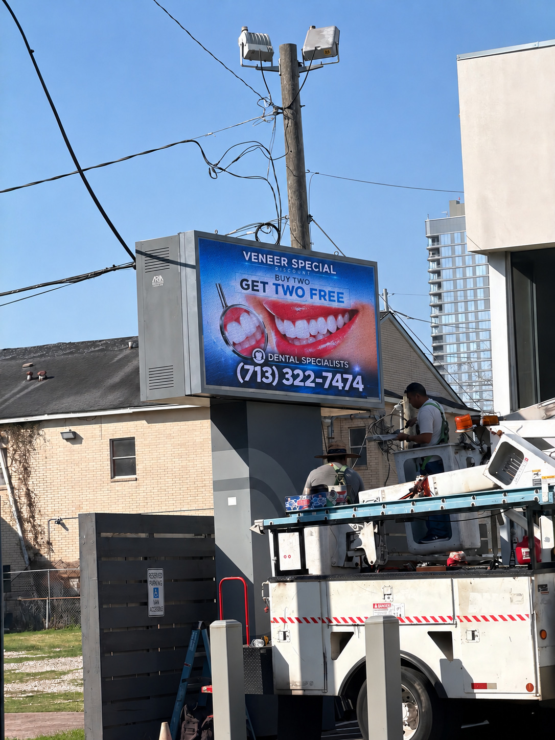 Freestanding commercial LED sign during installation